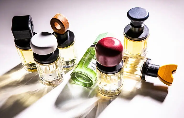 Multiple perfume samples arranged artistically