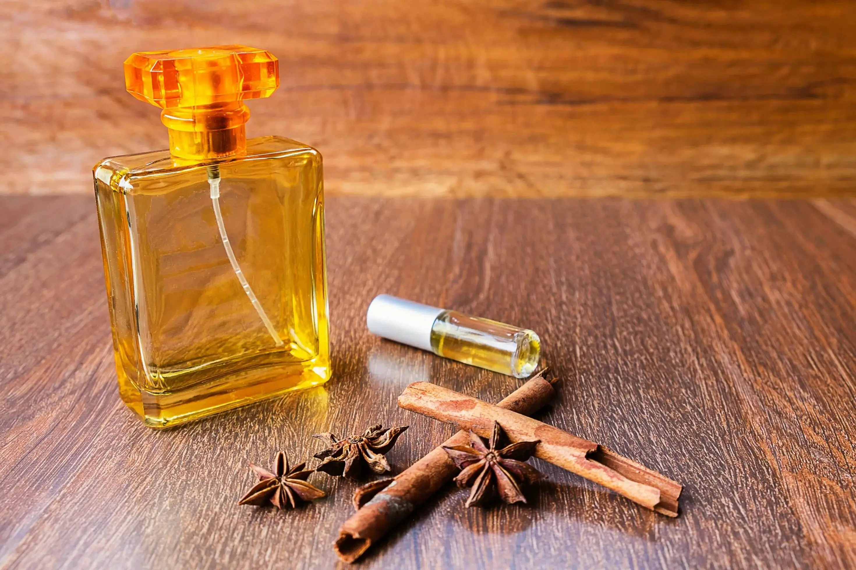 A warm, inviting scene with spices like cinnamon and star anise, representing the Oriental fragrance family