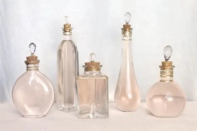 A collection of vintage perfume bottles stored carefully